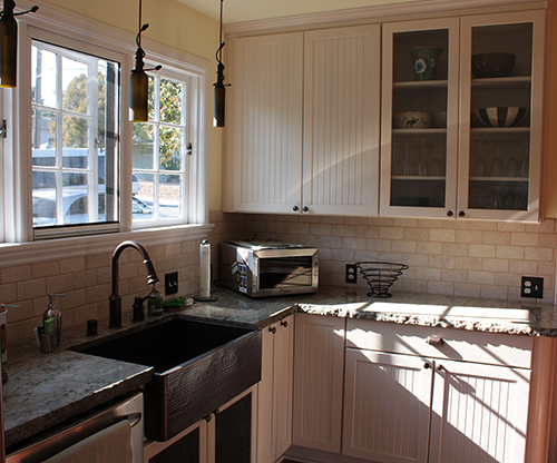 An updated kitchen in a 1936 Tudor Revival home by architect William Strickland.  Martinez, CA